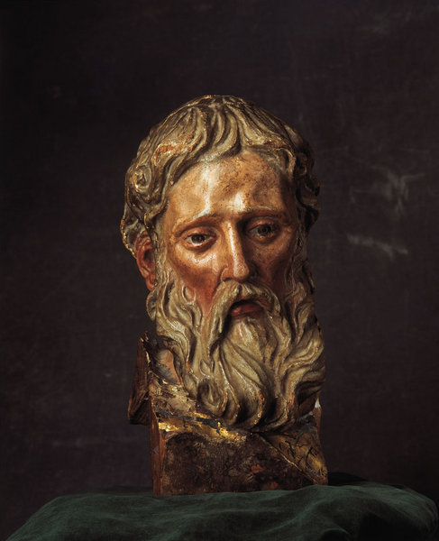 A Fine Spanish carved polychrome head of a saint